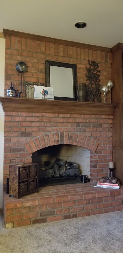 Wanted a neutral color palate with asymmetry for my red brick fireplace. Red Brick Fireplace Mantle, Exposed Brick Living Room, Christmas Mantle Decor Fireplaces, Brick Makeover, Brick Fireplace Mantles, Red Brick Fireplace, Brick Fireplace Decor, Fireplace Molding, Parrilla Interior