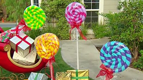 Learn to make these cheap giant yard lollipops from pool noodles this Christmas