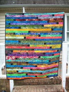 Sew Cook and Travel: Dark Batiks Jelly Roll Race Quilt with Spacers Finished Jelly Roll Quilting, Quilt Jelly Roll, Jelly Roll Quilts, Jelly Roll Race Quilt, Jelly Roll Race, Colchas Quilting, Jelly Roll Quilt, Watercolor Quilt, Jelly Roll Patterns