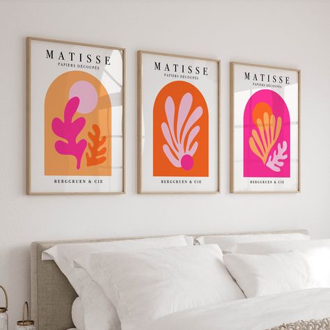 Elevate your space with this vibrant Set of 3 Matisse Prints in Pink & Orange. These colorful wall art pieces bring a funky, preppy aesthetic to any room, making them perfect for apartments, college dorms, and girls' rooms. The bold pink and orange hues create a trendy triptych that adds a burst of energy and style to your decor. Ideal for anyone looking to infuse their space with personality and contemporary flair, these prints are versatile and can seamlessly fit into various decor styles. Whe Orange And Pink Living Room Decor Ideas, Bathroom Decor Pink And Orange, Pink Orange Yellow Room Decor, Pink Orange Decorations, Pink Orange Wall Art, Orange Toned Bedroom, Pink And Orange Interior Design, Red And Pink Aesthetic Room Decor, Pink And Orange Room Ideas