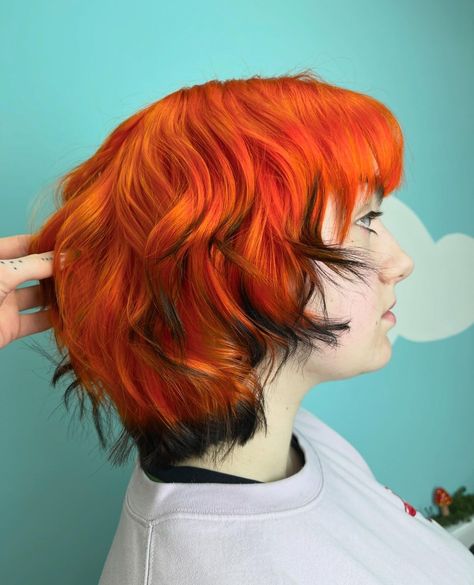 Sign us up for an Electric Tiger Lily transformation 🐯🔥 Extremely bold and extremely bright, that's what we look for in our orange semi-permanent hair dyes 🍑  @hairbygeorgiaa_ 🐯  #manicpanic #manicpanicprofessional #hair #haircare #hairstylist #hairinspo #healthyhair #hairstyles #hairsalon #crueltyfreebeauty #haircolor #veganhair #crueltyfreehairdye #saloninternational Orange Vivid Hair, Sunset Colored Hair, Brown Hair With Orange Tips, Tiger Hair Color, Orange Blue Hair, Fox Dyed Hair, Dyed Ginger Hair, Orange Hair Short, Orange And Black Hair