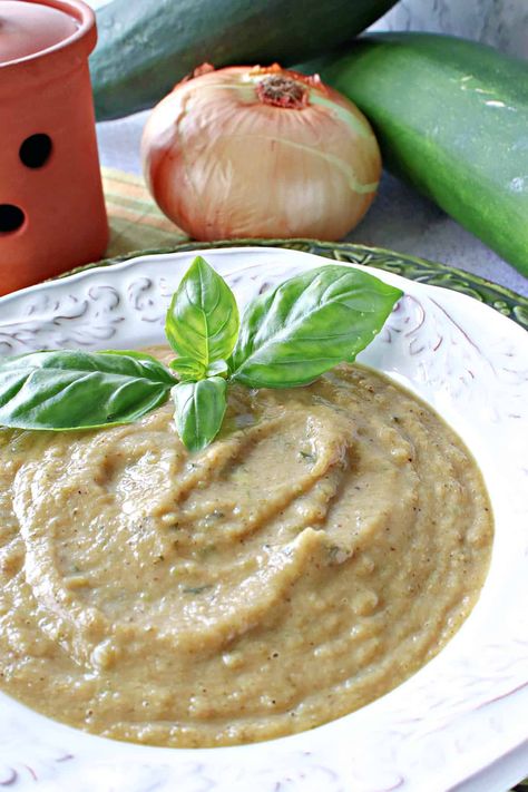 When served in a bowl, roasted Garlic and Zucchini Soup is a deliciously mellow yet super flavorful creamed soup. Or it can be served as a unique pasta sauce as a delectable main course or side. #creamedsoup #vegetablesoup #comfortfood #zucchinisoup #garlicsoup #roastedvegetablesoup #vegetablepastasauce #savoryzucchinirecipe #roastedgarlic #italiansoup #blendersoup #blendersauce #pastasauce #kudoskitchenrecipes Creamy Zucchini Soup, Unique Pasta, Roasted Vegetable Soup, Sauce For Pasta, Bisque Soup, Dairy Free Recipes Dinner, Roasted Zucchini, Roast Zucchini, Zucchini Soup