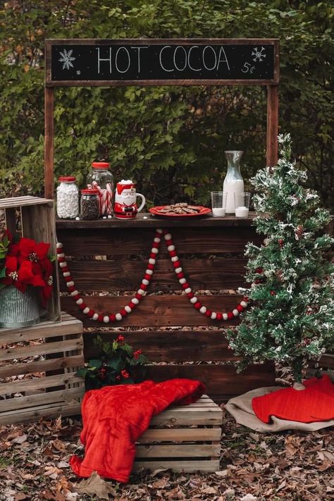 Holiday Photoshoot Setup Ideas, Hot Coco Stands Ideas, Christmas Trees For Sale Photoshoot, Christmas Tree Stand Photoshoot, Santa Picture Backdrop Ideas Diy, Diy Hot Chocolate Stand, Hot Chocolate Christmas Pictures, Christmas Cabin Photoshoot, Christmas Tree Lot Ideas