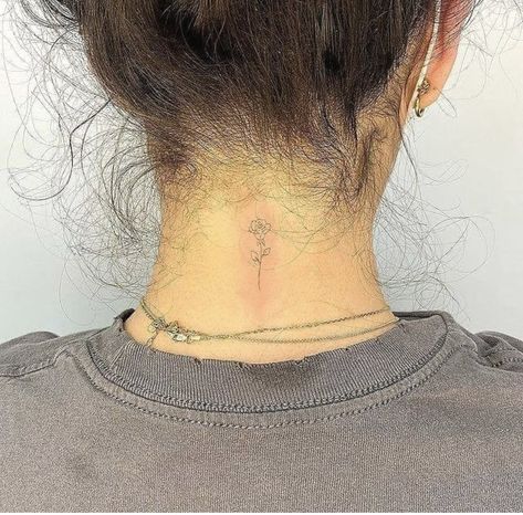 Small Rose Tattoo On Neck, Small Behind The Neck Tattoos, Fine Line Tattoo Back Of Neck, Base Of The Neck Tattoo, Minimalistic Neck Tattoo, Behind Neck Tattoo Woman Simple, Back Of Neck Tattoo Flower, Rose Back Of Neck Tattoo, Simple Back Of Neck Tattoo