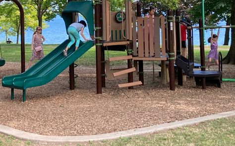 Top Materials to Put Under Playsets | Kids Gotta Play Playground Surface, Playground Safety, Rubber Mulch, Kids Play Set, Outdoor Play Areas, Wood Mulch, Outdoor Play Area, Tyres Recycle, Play Structure