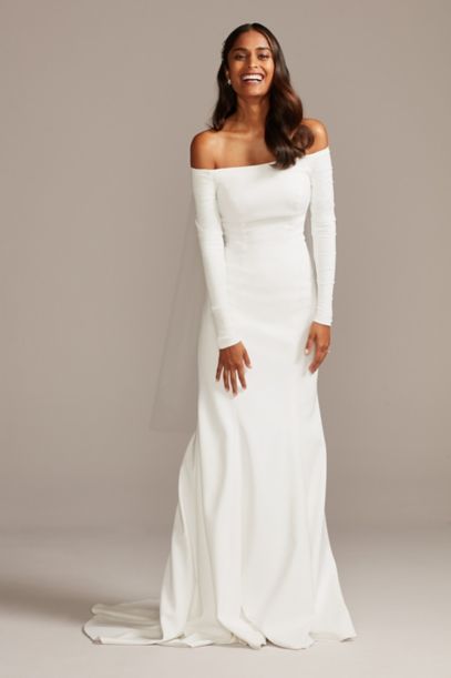 Off-the-Shoulder Buttoned Back Crepe Wedding Dress WG3990 Petite Wedding Dress, Crepe Wedding Dress, Davids Bridal Wedding Dresses, White Wedding Dress, Affordable Wedding Dresses, Off The Shoulder Long Sleeve, Wedding Dress Trends, Long Sleeve Wedding, Winter Wedding Dress