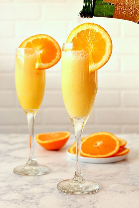 Mimosa Recipe Orange, Orange Creamsicle Mimosa, Creamsicle Mimosa, Frozen Peach Bellini, Mimosa Drink, Cranberry Mimosa, Festive Holiday Drinks, Make Cocktails, Easy To Make Cocktails