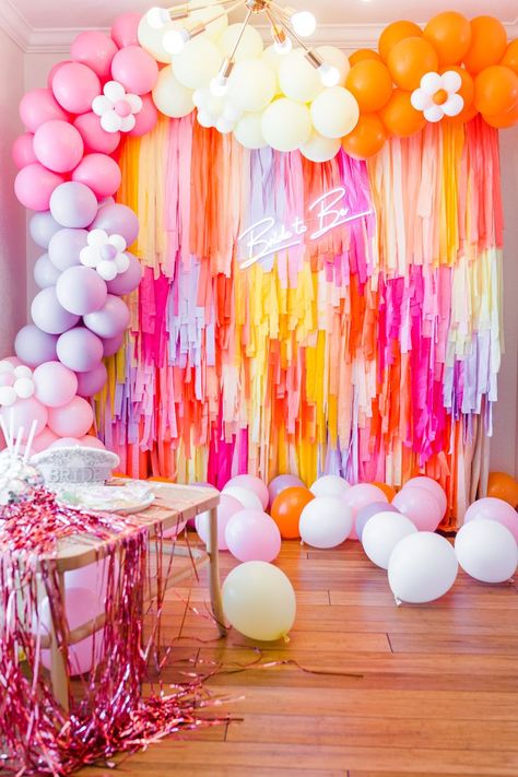 Colorful and Groovy Fringe and Garland for Dazed & Engaged Bachelorette Party Theme 70a Retro Backdrop With Balloons For Couples Table, Backdrops From Tablecloths And Balloons, Flower Power Bachelorette Theme, Flower Child Bachelorette, Dazed And Engaged Bachelorette, Bachelorette Bags, Streamer Wall, Fringe Decor, Coachella Party