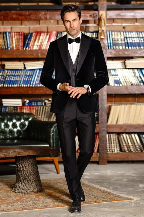 Unveil the epitome of refined elegance with our Black Velvet Slim-Fit Tuxedo 3-Piece ensemble. As you envelop yourself in the velvety embrace of this opulent attire, prepare to leave an indelible mark on the canvas of style and sophistication.  #suits #suit #slimfit #tuxedo #velvettuxedo #blacktuxedo #formallook #formalwear #mensstyle #menfashion Black Velvet Suit Mens, Black Velvet Blazer Men, Velvet Wedding Suit, Black Velvet Tuxedo, Blazer Waistcoat, Double Breasted Tuxedo, Suit Stores, Velvet Wedding, Backyard Reception