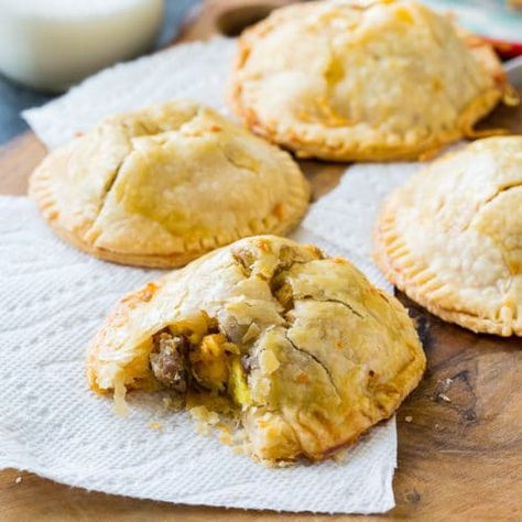 Sausage, Egg and Cheese Hand Pies Turkey Empanadas, Cheese Hand Pies, Spicy Southern Kitchen, Refrigerated Pie Crust, Hand Pie, Egg Cheese, Egg And Cheese, Southern Kitchen, Colby Jack