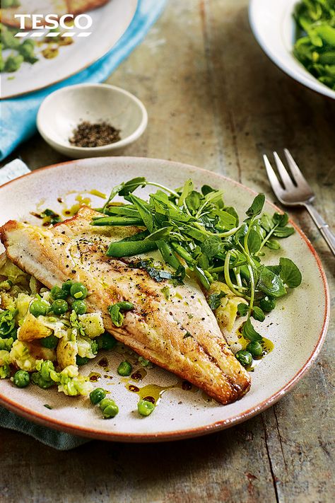 Grab a speedy fish dinner with this pan-fried sea bass recipe. Pan-frying is super quick and gives the fillets crisp, golden skin - delicious with a simple side of crushed potatoes and peas plus a fragrant tarragon salad. | Tesco Tarragon Salad, Sea Bass Recipe, Bass Recipe, Potatoes And Peas, Sea Bass Recipes, Golden Skin, Crushed Potatoes, Pan Frying, Top Chicken Recipes