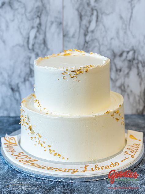 Gold Flakes On Cake, Gold Flakes Cake, White And Gold Cake Simple, Simple Two Tier Cake, Gold Flake Cake, Cake With Gold Flakes, New Years Cake, Gold And White Cake, Bachelor Cake