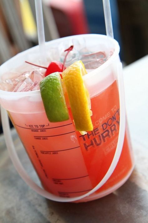 13 must-try drinks at Alabama's beaches - al.com Voodoo Punch, Rum Bucket Recipe, Bucket Drinks, Drink Bucket, Coctails Recipes, Beach Drinks, Rum Drinks, Tropical Drink, Alcohol Drink Recipes