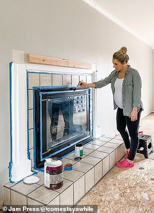 Mother adds $30,000 to house value with crafty DIY makeover Diy Tile Fireplace Makeover, Diy Tile Fireplace, Tile Fireplace Makeover, Paint Fireplace Tile, Tile Around Fireplace, Corner Fireplace Makeover, High Heat Paint, Fireplace Update, Modern Farmhouse Diy