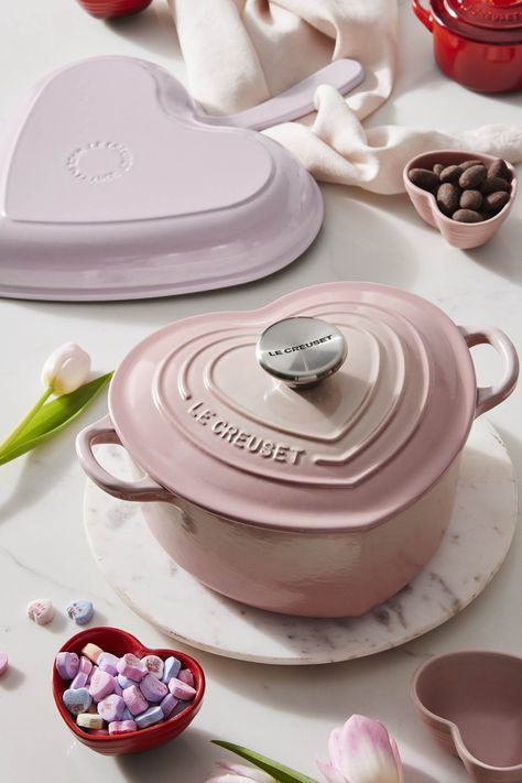 The Le Creuset Hearts Collection features Dutch Ovens, cocottes and kitchen accessories that have been fashioned into swoon-worthy heart shapes or topped with gold and silver heart knobs. Available in our passionate red Cerise, sweet Licorice black, and delicate Shell Pink colors, the collection is sure to warm hearts. Heart Shaped Le Creuset, Le Creuset Cocotte, Le Creuset Aesthetic, Pink Kitchenware, Pink Kitchen Inspiration, Pink Le Creuset, Le Creuset Heart, Le Creuset Pink, Heart Shaped Plate