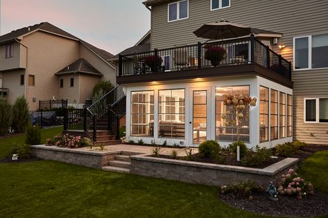 Tuck Under Porch with a View in Maple Grove | Murphy Bros 3 Season Porch Under Deck, Screened In Porch With Balcony Above, 2 Story Deck With Screened In Porch, Upper Deck Ideas Second Story Screened In Porch, Screen Porch Under Deck Ideas, Decks Over Walk Out Basement, Sunroom Under Deck, Walk Out Deck Ideas, Screened In Patio Under Deck