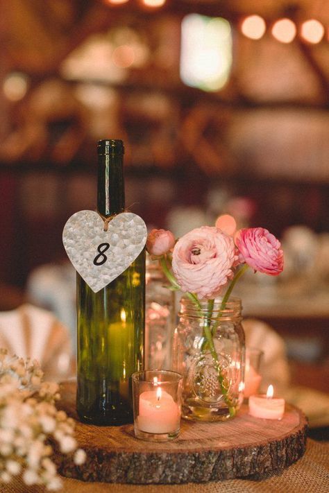 Wine Bottle And Mason Jar Centerpieces For Wedding, Wine Bottle Mason Jar Centerpiece, Green Wine Bottle Wedding Centerpieces, Wine Bottle And Mason Jar Centerpieces, Bottle Lights Wedding, Vintage Wedding Centerpieces, Wedding Centerpieces Mason Jars, Centerpieces Rustic, Beautiful Wedding Centerpiece