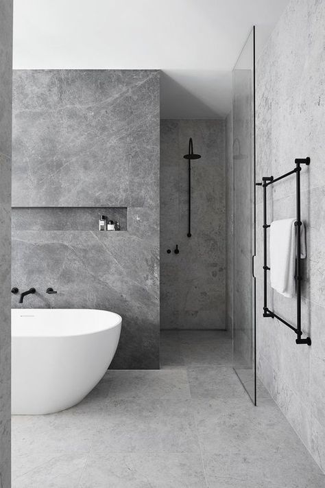 10 Stunning Stone Tile Bathroom Designs That Made Our Editors Do a Double Take | Hunker Drømme Bad, Stone Tile Bathroom, Makeover Kamar Mandi, Minimal Bathroom, Decor Ikea, Bathroom Tile Designs, Bad Design, Minimalist Bathroom, Black Bathroom