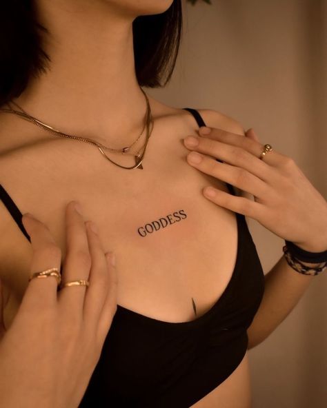 Goddess Word Tattoo, Chest Tattoo Words, Cutesy Tattoos, Chest Tattoo Quotes, Tattoo On Chest, Cupid Tattoo, Stunning Tattoos, Tattoo Chest, Aquarius Tattoo