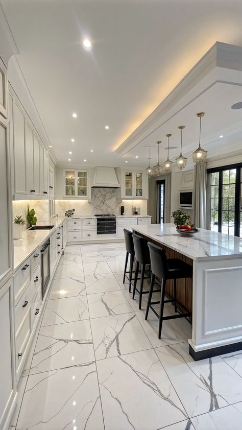 Black and White Modern Kitchen Ideas Lighted Marble Countertops, White Kitchen With Marble, Kitchen Lighting Ideas Over Island, Black And White Modern Kitchen, Cool Home Features, White Marble Kitchen Countertops, Statement Island, White Modern Kitchen Ideas, Marble Kitchen Backsplash