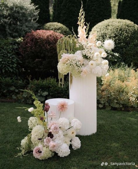 Neutral And Green Wedding Decor, Whimsical Florals Wedding, Altar Flower Arrangements Wedding, Modern White Floral Centerpiece, Ethereal Flower Arrangements, Wedding Aisle Florals Outdoor, Flowers On Plinths Wedding, Alter Florals Wedding, Wispy Flower Arrangements