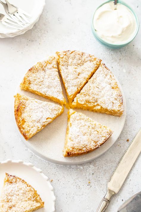 Learn how to make this delicious Easy Gluten-Free Belgian Lemon Tea Cake. So simple to make, and even easier to eat! Head to the blog to get more details and the recipe.  Lemon Cake | Gluten-Free Lemon Cake  #lemoncake #glutenfreecake #glutenfreelemoncake  #belgianlemonteacake #cakerecipes #easyrecipes #easycakerecipes #itsnotcomplicatedrecipes #cravecookconsume  itsnotcomplicatedrecipes.com Gluten Free Lemon Cake, Curd Cake, Lemon Tea Cake, Lemon Curd Cake, Complicated Recipes, Lemon Curd Filling, Tea Cake, Lemon Tea, Lemon Desserts