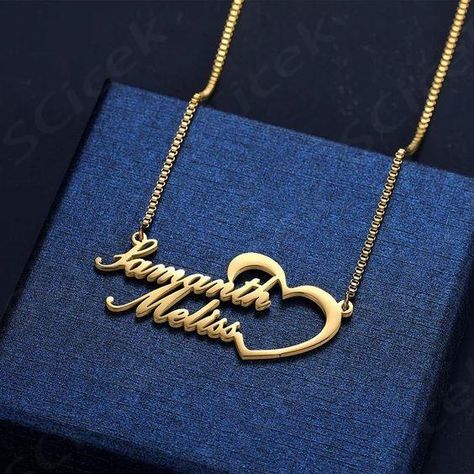 This adorable personalized necklace is the best gift for Valentine's day, wedding, anniversary or any occasion. You can engrave two names on this beautiful pendant. Material : Stainless Steel Pendant Size: 5*5CM (approximately) Chain style: Box 2mm Click Add a note to your order before checkout, to provide us the Two Names you want on the necklace with the font. The sample in the pictures is in Font  ... more Name Chains Necklace Gold Designs, Small Gold Necklace, Names Necklace, Gold Bracelet Simple, Locket Design, Gold Jewellry, Anklet Designs, Necklace With Heart, Gold Chain Design