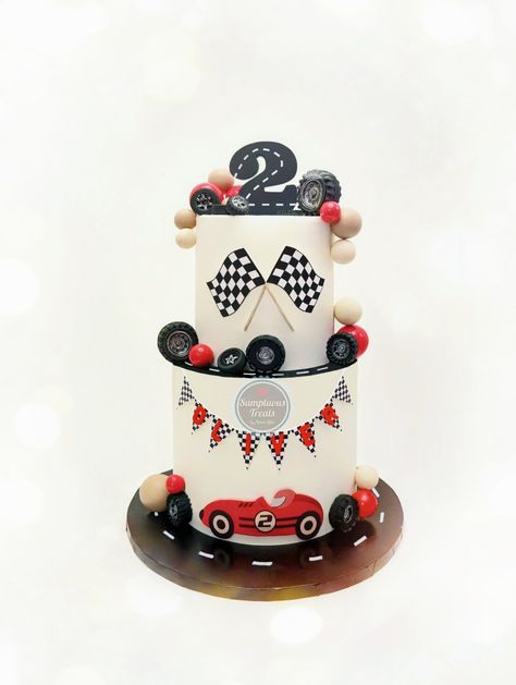 Racing Theme Cake #racing #racingcar  #cartheme #carthemecake #2ndbirthday #kidsbirthday #customcakes #sumptuoustreats #torontocakedecorator #cakes #torontocakes   www.sumptuoustreats.com Too Fast Cake Ideas, Fast 1 Birthday Cake, First Lap Birthday Cake, Too Fast Birthday Cake, Steering Wheel Cake, Two Fast Birthday Party Boy Cake, Racing Car Cake For Boys, Race Theme Cake, Race Birthday Cake