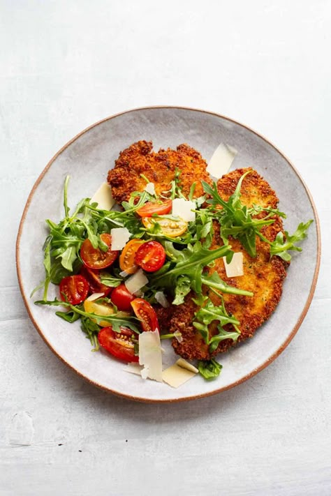 Crispy Chicken Milanese with Tomato Arugula Salad Tomato Arugula Salad, Fried Chicken Cutlets, Authentic Italian Food, Chicken Milanese, Dinners To Make, Chicken Dinners, Italian Chicken, Italian Dinner, Italian Recipes Authentic