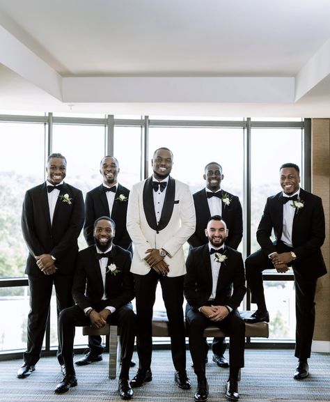 Wedding Ideas For Groomsmen Outfit, Black Suits For Groomsmen, Nigerian Groomsmen Attire, Black Tie Groomsmen Attire, Black And White Groomsmen Attire, Bride With Groomsmen Pictures, All Black Groomsmen Attire, Groomsmen And Bridesmaids Colors, Black Tux Groomsmen