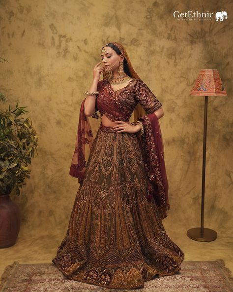 A regal blend of deep maroon and gold, adorned with dapka, sequins, and cutdana. ROOHDAR (روح دار) defines Bridal Luxury! ✨ For further inquiries and shipping details, please reach out to us at the following contacts: 📞India: 721 721 1400 📞US/Canada: +16614078200 📞Australia/ New Zealand:+61483918030 📞UK: +441908103655 #getethnic #roohdar #bridalelegance #bridalwear #customisedclothing #bridal #newcollection #weddingcollection #weddinglehenga #indianbride #bridesofindia #indianwedding #brid... Wedding Bride Outfit, Maroon Lehenga, Embroidered Bridal Lehenga, Indian Wedding Bride, Bridal Lehenga Collection, Deep Maroon, Indian Bridal Lehenga, Bridal Elegance, Lehenga Collection