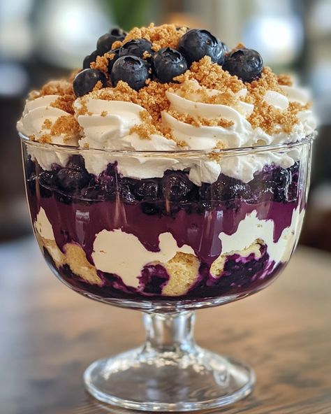 "This blueberry cheesecake trifle is the perfect dessert to impress! The layers of creamy cheesecake and sweet blueberries will have everyone asking for seconds.  I’ve been making this dessert for years and it always disappears fast! It’s a simple yet stunning treat that brings smiles to family gatherings. You have to try it!  Ingredients: - Blueberries - Cream cheese - Whipped cream  For the full recipe with instructions and other ingredients, check the link in first comment [👇] [👇].  #BlueberryCheesecake #DessertLover #Trifle #SweetTreats #FamilyFavorites" Blueberry Trifle Desserts, Cheesecake With Blueberry Topping, Elegant White Chocolate Blueberry Cheesecake, Sour Desserts, Blueberry Cheesecake Trifle, Fall Trifle Recipes, Cherry Trifle Recipes, New Years Desserts, New Year Dishes