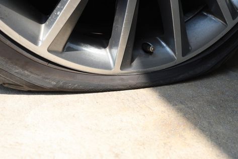 Close up on car flat tire Premium Photo | Premium Photo #Freepik #photo #car #road #black #flat Flat Tyre On The Road, Flat Tire Pictures, Car Flat Tire, Flat Tyre, Megara Disney, Tire Pictures, Made Coffee Table, Church Pictures, Motorcycle Pictures