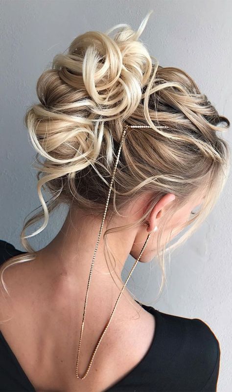 16. Messy Curly Twirled Updo We don’t know about you, but we’re kind of over updo hairstyles, especially hot warmer seasons are ahead of... Ladies Updo Hairstyles, Bridesmaid Hair Updo High Neck Dress, Updo 2023 Trends, Cute Hoco Hairstyles Up Dos, Loose Hair Updos, Glamorous Updo Hairstyles, Updo 2023, Updo 2022, Edgy Updo Hairstyles