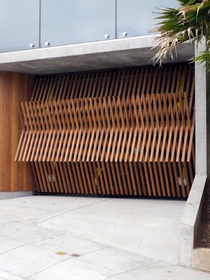 Bi-folding garage door // Folding Garage Doors, Unique Garage Doors, Best Garage Doors, Modern Garage, Door Inspiration, Door Insulation, Into The Wood, Design Blogs, Garage Design