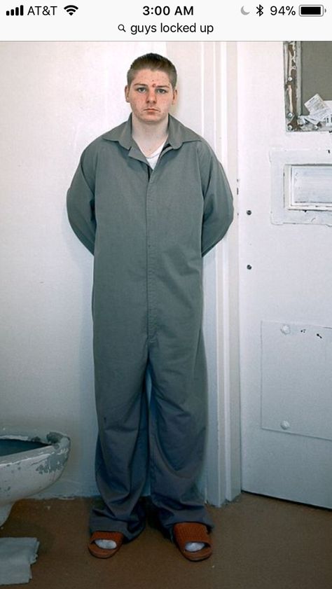 Prisoner standing in cell wearing jumpsuit uniform Vintage Prison Uniform, Jumpsuit Uniform, Prison Uniform, Prison Jumpsuit, Prison Outfit, Prisoner Costume, Men In Uniform, Iconic Movies, Costume Design