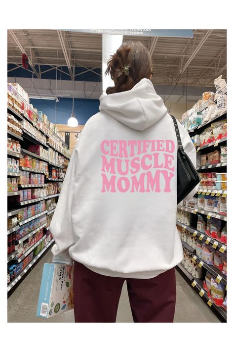 Elevate your gym style with our "Certified Muscle Mommy" jumper! Designed to empower and inspire, this jumper is perfect for women who love to go to the gym and excel in powerlifting, weightlifting, bodybuilding, and strength training. Whether you're smashing deadlifts, crushing squats, or conquering any challenge. gift for her gymrat #CertifiedMuscleMommy #GymApparelForWomen #PowerliftingWomen #Weightlifting #Bodybuilding #StrengthTraining #EmpoweringWorkout #FitnessEnthusiast #WomenInFitness Power Lifting Women, Gym Pump Cover, Gym Pump, Muscle Mommy, Gym Apparel, Thick Thighs Save Lives, Pump Cover, Love Clothing, Body Building Women