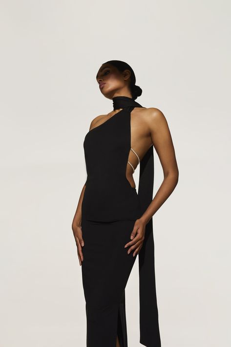 The Kara scarf dress is the definition of 'classy'. Made from Ponte di roma, this dress features a draped wrap-neck which elegantly drops across the back and seductive low-cut open back with adjustable pearl strap details. We would style this classic black dress with pearl or diamanté's bracelets and simple, sophisticated, scrappy heels to allow the dress to do the talking. Please read the product, fit and sustainability details before completing your purchase. Black Dress With Pearls, Classic Black Dress, Simple Black Dress, Scarf Dress, Event Outfit, Fashion Aesthetics, Prom Outfits, Long Black Dress, Event Dresses