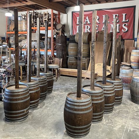 We have hundreds of beautiful French Oak wine barrels, each with a rich history of aging Cabernet or Pinot Noir, which imparts a deep purple hue to the wood. These full barrels will make a great focal point in your yard, garden, business, or house. Each barrel comes with a cooperage marking from the barrel maker, adding a touch of uniqueness to each piece. To ensure the utmost quality, we clean both the interior and exterior of every barrel. The edges are delicately sanded to achieve a perfect smooth texture, and the bands are securely fastened for lasting stability. We take the quality of these barrels very seriously. Dimensions: 35" Tall x 28" Mid Diameter x 23" Top Diameter. 110 lbs Upgrades available on our website: https://www.barreldreams.com/product/wine-barrel-post-lighting/8?cp=tr Wine Barrel Post Lights, Whiskey Barrel Light Poles, Wine Barrel Light Poles, Wine Barrel Lights, Whiskey Barrel Ideas, Wine Barrel Lighting, Wine Barrel Fire Pit, Barrel Fire Pit, Wine Barrel Wall