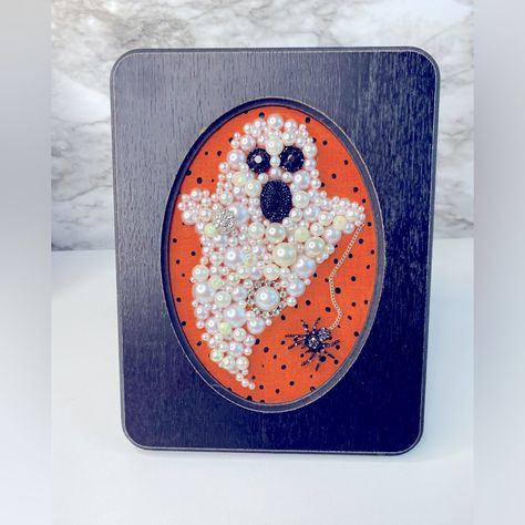 Framed Jewel Art Halloween Ghost With Spider Unique Handmade Jewel Art Ghost Made Of Rhinestone And Pearls White Themed Ghost With Black Rhinestone Eyes And Mouth Black Rhinestone Spider Dropping From Ghost Framed Wonderfully In A Mat Black Wood Frame Halloween Decor Halloween Ghost Ghost Art Spooky Button Halloween Crafts, Halloween Framed Art, Rhinestone Spider, Jeweled Picture Frame, Art Ghost, Jewel Art, Jeweled Picture, Buttons Crafts, Ghost Ghost