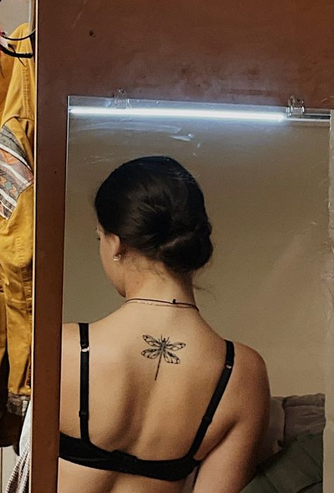 Aesthetic White Tattoo, Survivor In Chinese Tattoo, Back Tattoo Women Dragonfly, Dragonfly Tattoo On Stomach, Flying Dragon Back Tattoo, Dragonfly Back Tattoo Women Spine, Spine Tattoo Dragonfly, White Dragonfly Tattoo, Matching Dragon Fly Tattoo