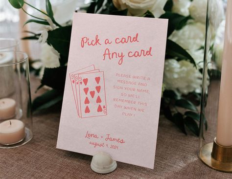 🤍SALES🤍 Buy THREE items and save 15% with code SAVE15 Buy FOUR items and save 25% with code SAVE25 Looking for a creative way to personalize your wedding guest book? With our "Pick a Card" sign template, you can add a fun and unique touch to your special day. This playing cards guestbook sign is perfect for a minimalist wedding looking to stand out. Let your guests sign your guestbook with this editable sign template, featuring hand-drawn illustrations that will make your guest book signing ex Pink Encouraged Wedding Guest, Custom Wedding Playing Cards, Pick A Card Any Card Guest Book, Deck Of Cards Guest Book, Playing Card Guest Book, This Is Your Sign To, Guest Book Creative, Personal Wedding Touches, Alternative Guest Book Ideas