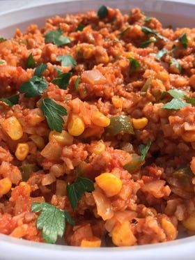 Here's a spicy Spanish twist with cauliflower rice Spanish Cauliflower, Spanish Cauliflower Rice, Main Dish Casseroles, Cauliflower Rice Recipes, Cauliflower Fried Rice, Rice Noodles, Rice Dishes, Cauliflower Rice, Spicy Recipes