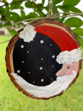 View Wood Slice Ornaments by marmidesigns on Etsy Santa Moon, Handpainted Christmas Ornaments, Wood Slice Ornaments, Painted Santa, Inexpensive Christmas Gifts, Painted Ornament, Painted Christmas Ornaments, Holiday Craft, Christmas Wood Crafts