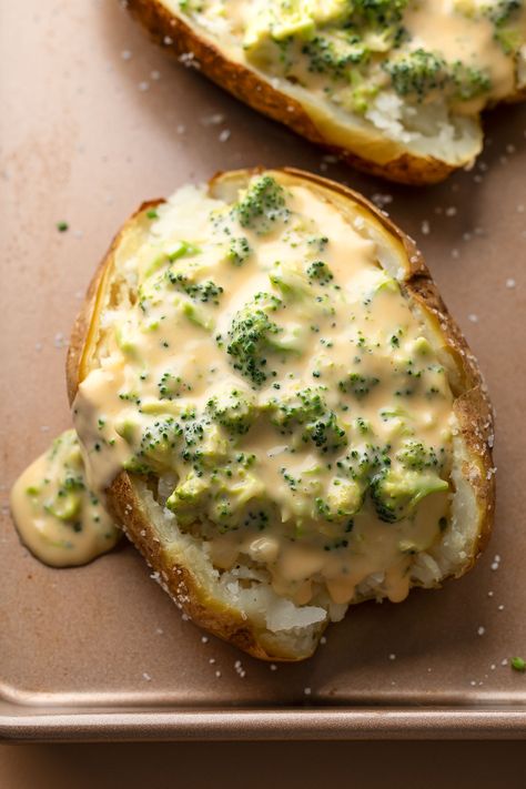 Cheesy Baked Potatoes with Broccoli Cheese Sauce Broccoli And Cheese Baked, Cheesy Baked Potatoes, Broccoli Cheese Sauce, Double Baked Potatoes, Baked Potato With Cheese, Cheesy Broccoli Rice Casserole, Crock Pot Baked Potatoes, Cheese Sauce For Broccoli, Cheesy Broccoli Rice