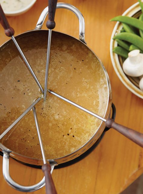 Fondue night in the cards? Then this tasty roasted garlic broth, perfect for beef and game meats, will be the perfect addition to the party! Broth Fondue Recipes, Fondue Broth, Easy Fondue Recipes, Fondue Recipes Meat, Garlic Broth, Cheddar Fondue, Melting Pot Recipes, Fondue Dippers, Easy Fondue