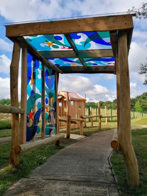 Colourful sea themed canopy panel for a SEN playground. Head to our website for more school playground designs: www.naturalplayscapes.co.uk Playground Tunnel, School Playground Design, Community Park Design, Community Playground, Outdoor Play Space, Outdoor Play Spaces, Garden Canopy, Sensory Garden, School Interior