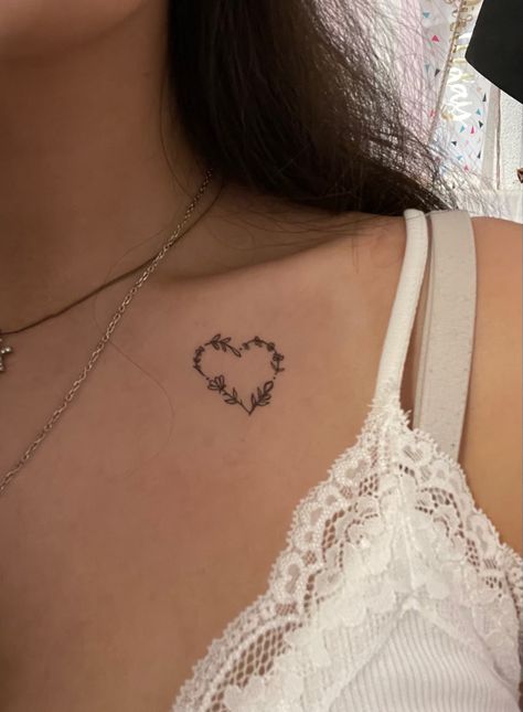 Hidden Tattoo For Women, Heart Tattoos On Chest, Cute Small Chest Tattoos For Women, Collarbone Tattoo Grunge, Collar Bone Tattoo Heart, Simple Collar Bone Tattoos For Women, Tattoo Hidden Placement, Tattoo Ideas Female Under Breast, Front Chest Tattoo Female