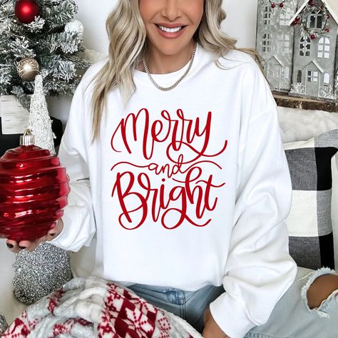 Merry & Bright Christmas Adult Christmas Shirt Embrace the holiday season with this festive Christmas shirt, the perfect addition to your wardrobe! Show off your Christmas spirit while staying stylish. Available in sizes small-3X, you can enjoy a cozy fit in two different styles. Let the joyful holiday vibes take over and get your hands on this must-have Christmas shirt today! Final Sale no returns on apparel Holiday Tshirts Ideas, Cute Christmas Shirts Vinyl, Christmas Cricut Shirts, Christmas Shirt Ideas Vinyl, Christmas Tshirt Ideas, Christmas Shirt Ideas, Christmas Graphic Tees, Holiday Shirt Ideas, Christmas Merch