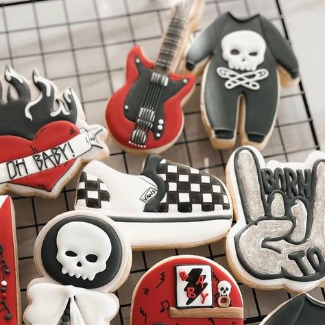 L A U R E N   A S H   C O O K I E S on Instagram: "This may be one of my new favorite baby sets! You guys always have the best themes for me to work with!  🤘🏻🖤‼️ . . . . . . . #borntorock #borntorockcookies #rockcookies #musiccookies #babycookies #babyshowercookieset #babyshowercookies #welcomebabycookies #rockandrollcookies #guitarcookies #skullcookies #babyboycookies #babygirlcookies #babyshowertreats #sugarcookies #decoratedcookies #decoratedsugarcookies #cookiesofinstagram #cookiegram #cookiedecorator #cookieart #sugarcookiesofinstagram" Born To Rock Baby Shower Ideas, Rock N Roll Baby Shower Ideas, Punk Rock Baby Shower, Rock Baby Showers, Punk Rock Baby, Baby Boy Cookies, Cookie Gram, Best Themes